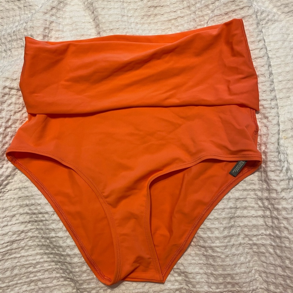 Bright coral fold over high waisted bottoms